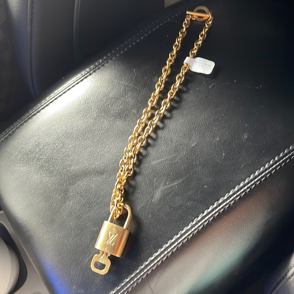 Authentic Louis Vuitton lock necklace —purchased for $280. NWT - Picture 2 of 8